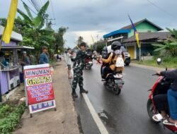 Babinsa Kodim 1001/HSU-BLG Siapkan Rest Area untuk Jamaah Haul Guru Sekumpul