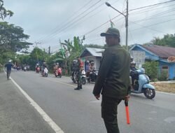 Babinsa Koramil Batumandi Pantau Arus Balik Jamaah Haul Guru Sekumpul
