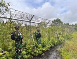 Personil Kopasgat Yahukimo Melaksanakan Penertiban Pagar Bandara dan Jalan Tikus Akses Warga di Sekitar Runway Bandara Nop Goliat Dekai