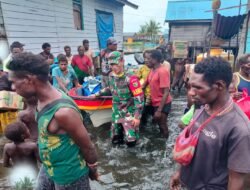 Peran Babinsa Koramil Kimaam Bantu Salurkan Sembako kepada Masyarakat Terdampak Banjir