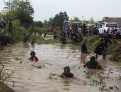 Kodim 1001 dan Warga Bersihkan Saluran Air untuk Optimalisasi Folder Alabio