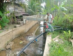 Babinsa Posramil 05/PC Kodim 0105/Aceh Barat Wujudkan Kepedulian Teritorial di Musim Kemarau