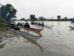 Babinsa dan Bhabinkamtibmas Dukung Lomba Dayung Tradisional dalam Rangka HUT ke-80 RI