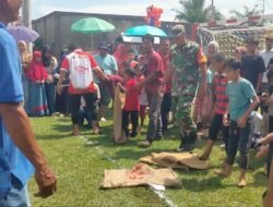 Babinsa Koramil Johan pahlawan semarakkan HUT-RI ke-80 dengan Giat lomba lari goni di desa Gampa