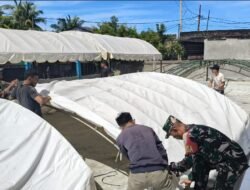 Gotong Royong Anggota Posramil Tadu Raya dan Warga dalam Rangka Menyambut HUT TNI ke-80