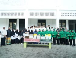 Persit KCK Koorcab Rem 012 PD Iskandar Muda Bagikan Bantuan kepada Anak Yatim