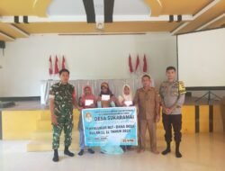 Babinsa Sukaramai Hadiri Pembagian BLT DD, Wujud Pendampingan TNI untuk Kesejahteraan Warga