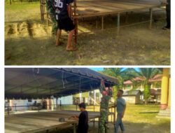 Babinsa Posramil 12/Panton Reu Bantu Warga Pasang Tenda di Gampong Mugo Rayeuk