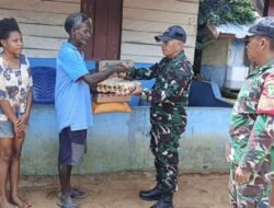 Bakti Sosial Natal, Koramil Okaba Perkuat Silaturahmi dengan Tokoh Adat Setempat