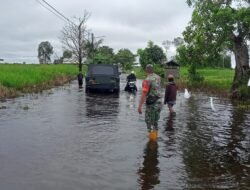 Sungai Amandit Meluap, Jalan Poros Kalumpang-Margasari Terendam, Babinsa Turun Kelapangan