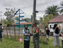 Dukung Pengijauan: Babinsa Koramil 1316-01/Tilamuta Bersama Mahasiswa UMGO Hijaukan Desa Pentadu Barat