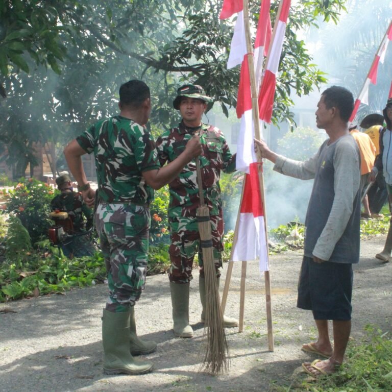 Jelang Penutupan TMMD Ke-127, Satgas dan Warga Pasang Umbul-Umbul