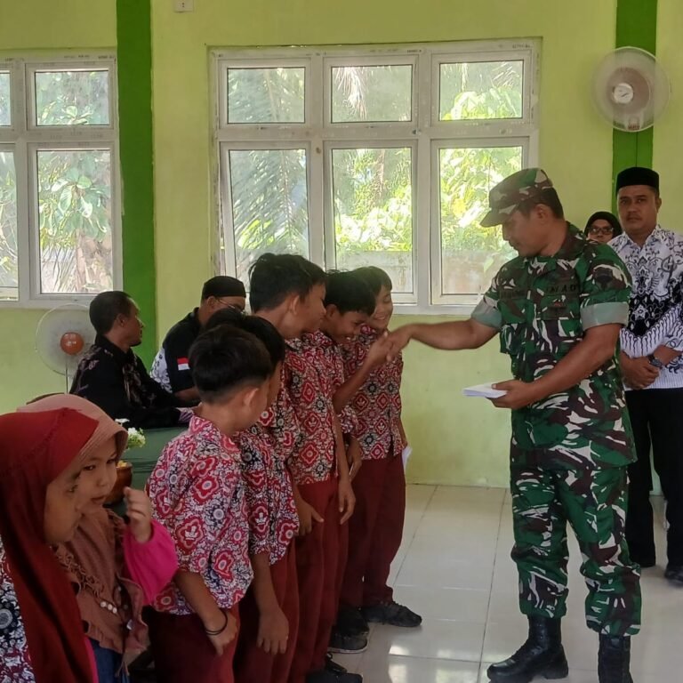 Danposramil Pasie Raya Hadiri Kegiatan Santunan Anak Yatim di SDN 2 Pasie Raya