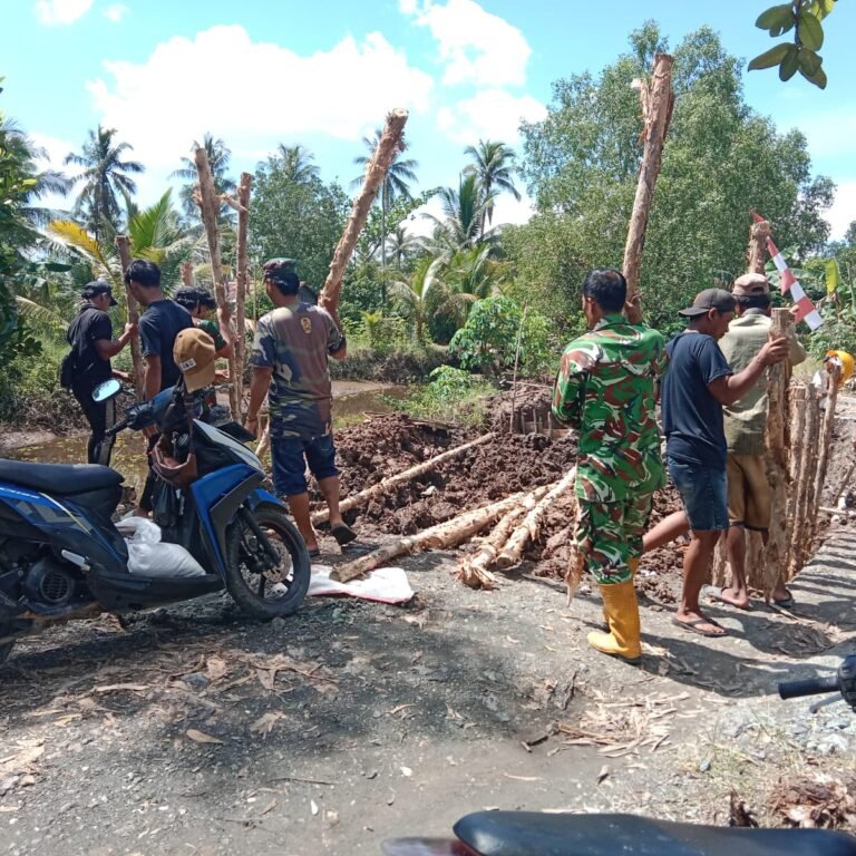 Kebersamaan TNI dan Warga: Membangun Jembatan Harapan di Tamban Bangun