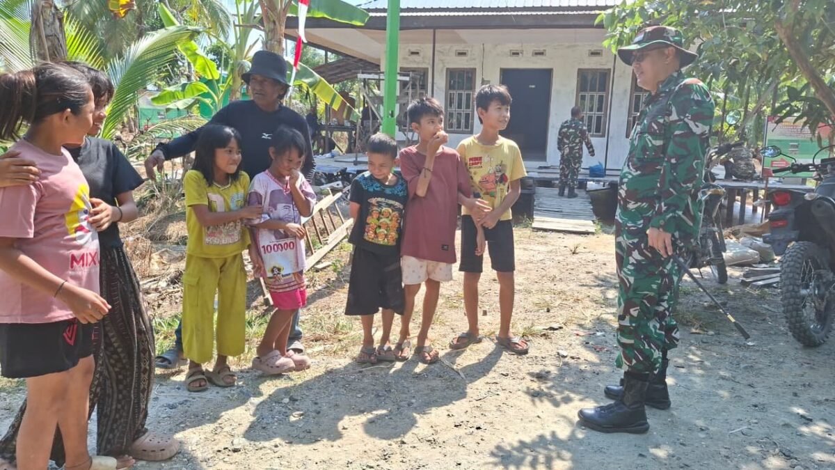 Senyum Ceria Warga Desa Tamban Bangun Saat Kegiatan TMMD Ke-129 Kodim 1005/Barito Kuala