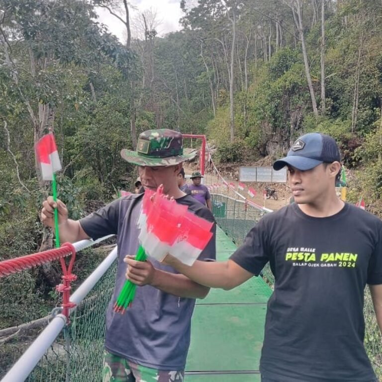 Persiapan Peresmian: Bendera Merah Putih Hiasi Jembatan TMMD 129 di Bone