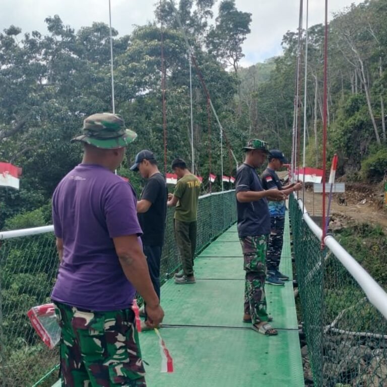 Puluhan Bendera Merah Putih Hias Jembatan Gantung TMMD 129 Kodim 1407/Bone