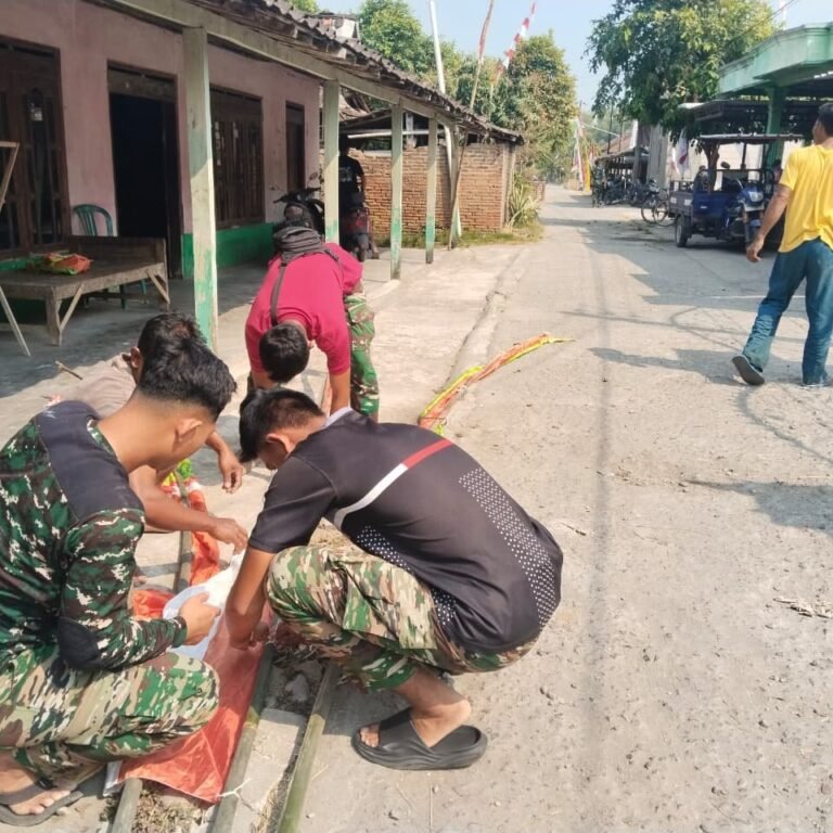 Parangjoro Kenakan Merah Putih, Warga dan Satgas TMMD Bersinergi
